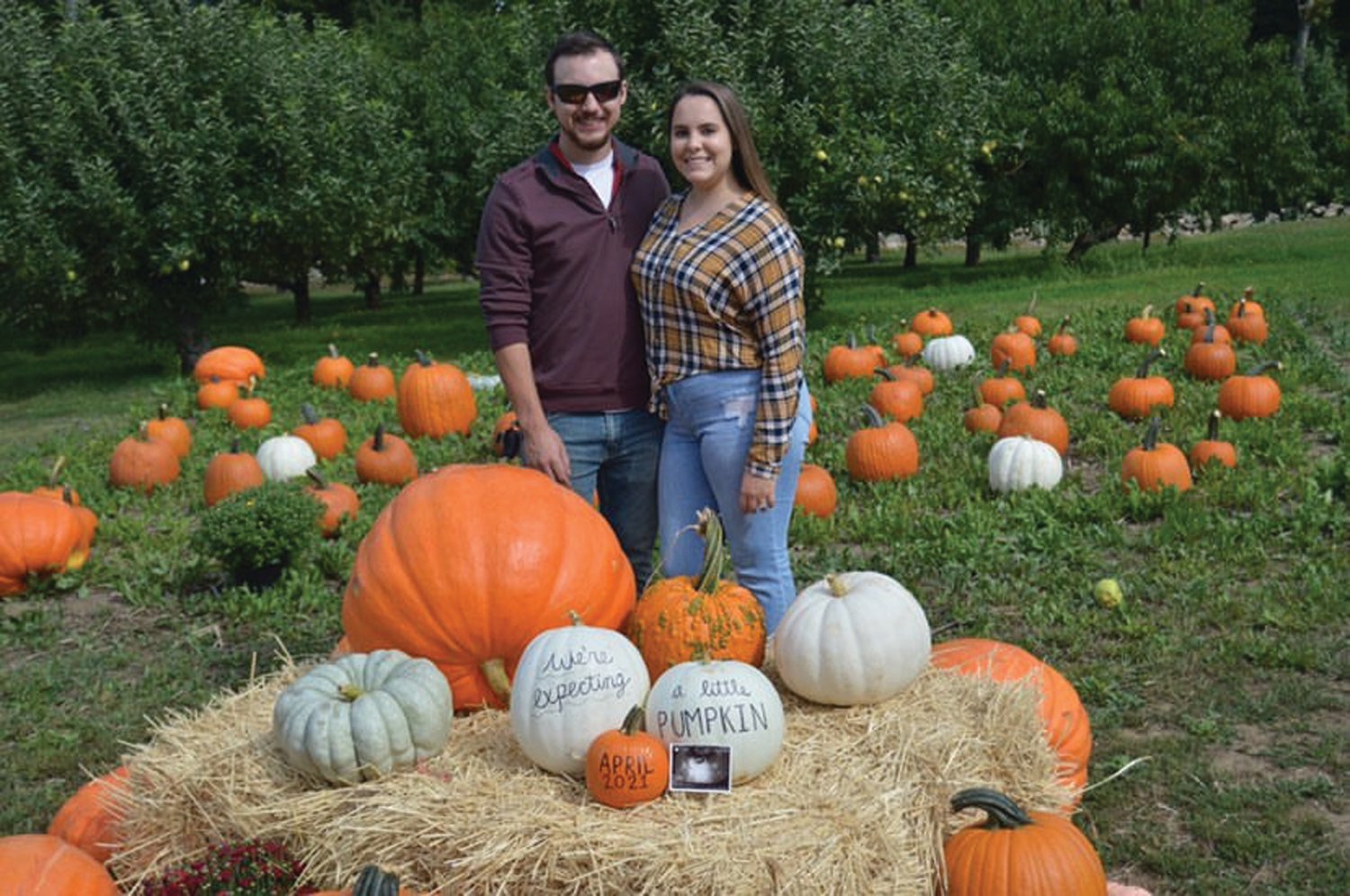 JOHNSTON HELPERS: The orchard owners will be assisted at the Apple Festival by cousin Alex DeNoncour and his fiancé Kaylee Hannagan, both Johnston residents.
